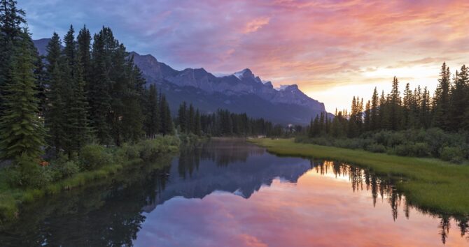 Alberta Foothills Dramatic Burning Red Sunset Sky Landscape in City of Canmore after late afternoon Canadian Rockies summer thunderstorm